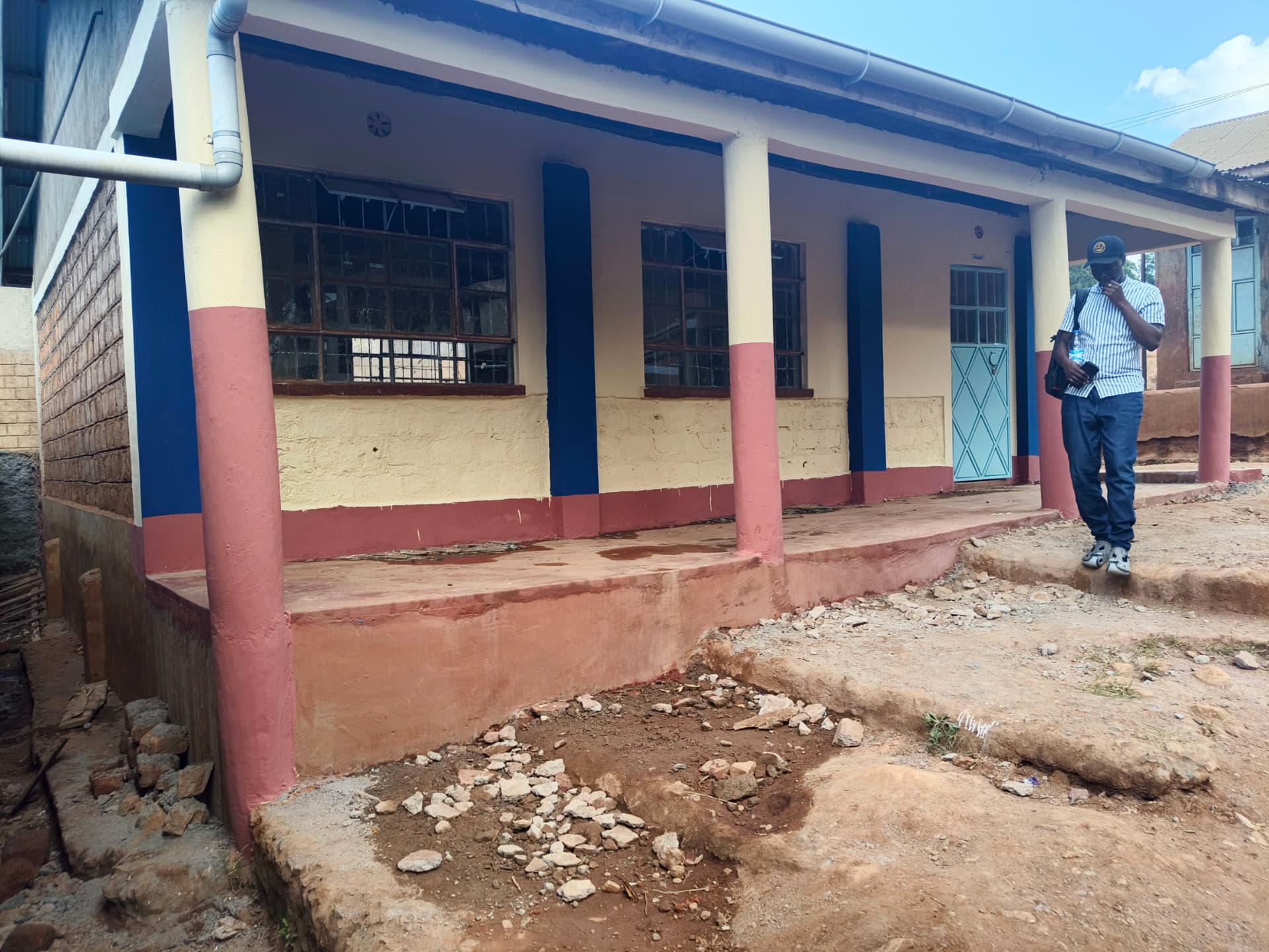 Repainted classroom veranda with new gutters and completed concrete apron