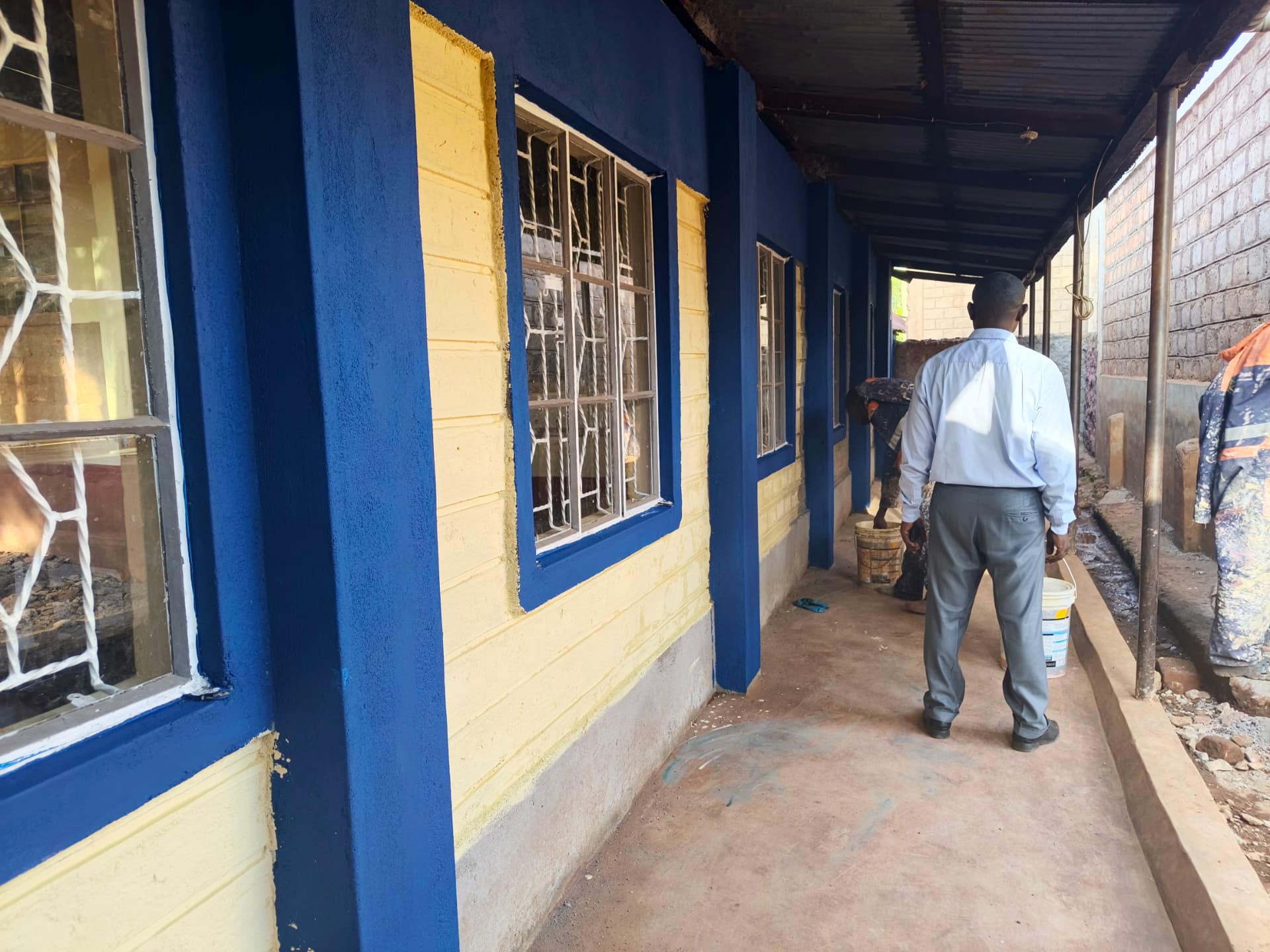 Completed blue and cream painted classroom corridor