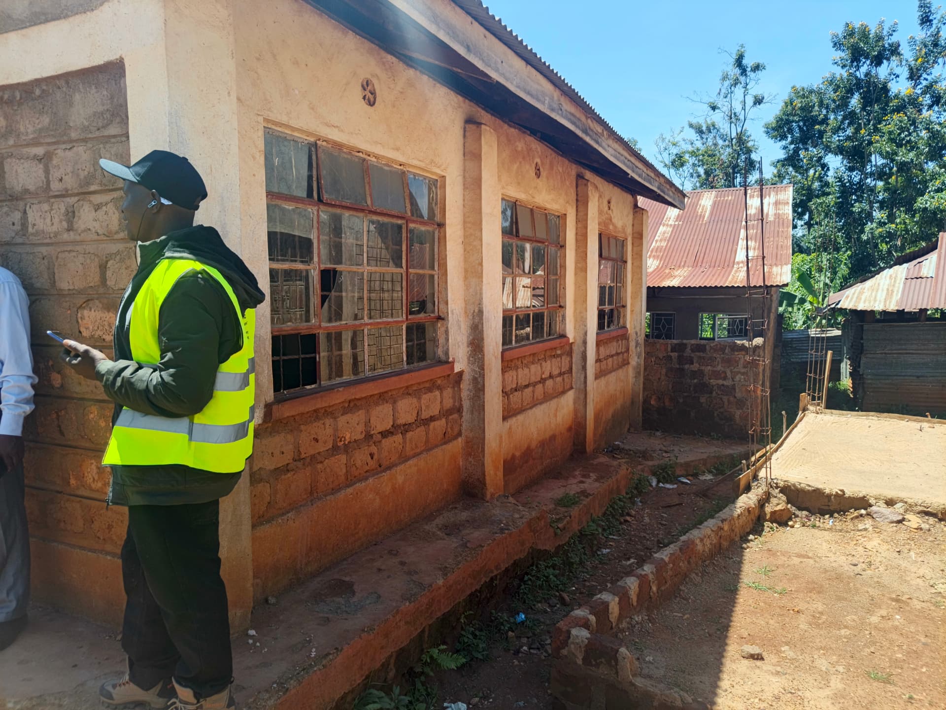 CFA team member assessing classroom windows during a site survey